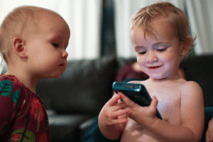 toddlers using a smartphone